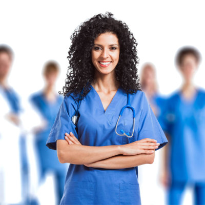 smiling nurse in front of a small medical team